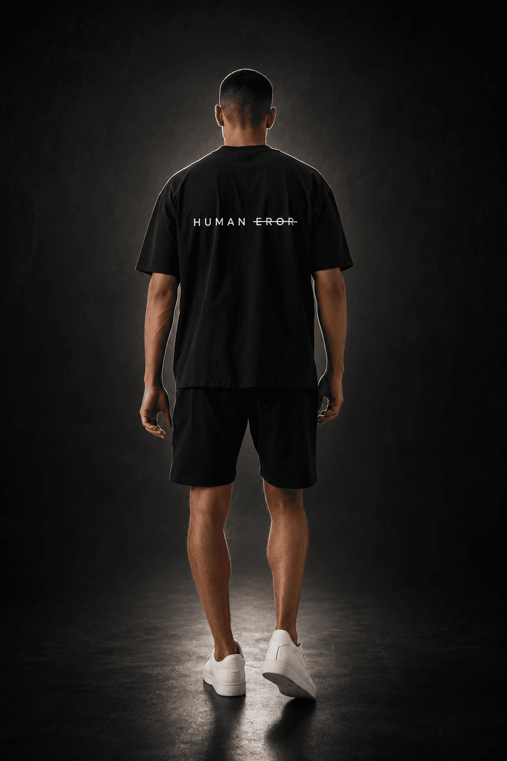 Model wearing a HUMAN EROR heavyweight streetwear t-shirt, viewed from behind